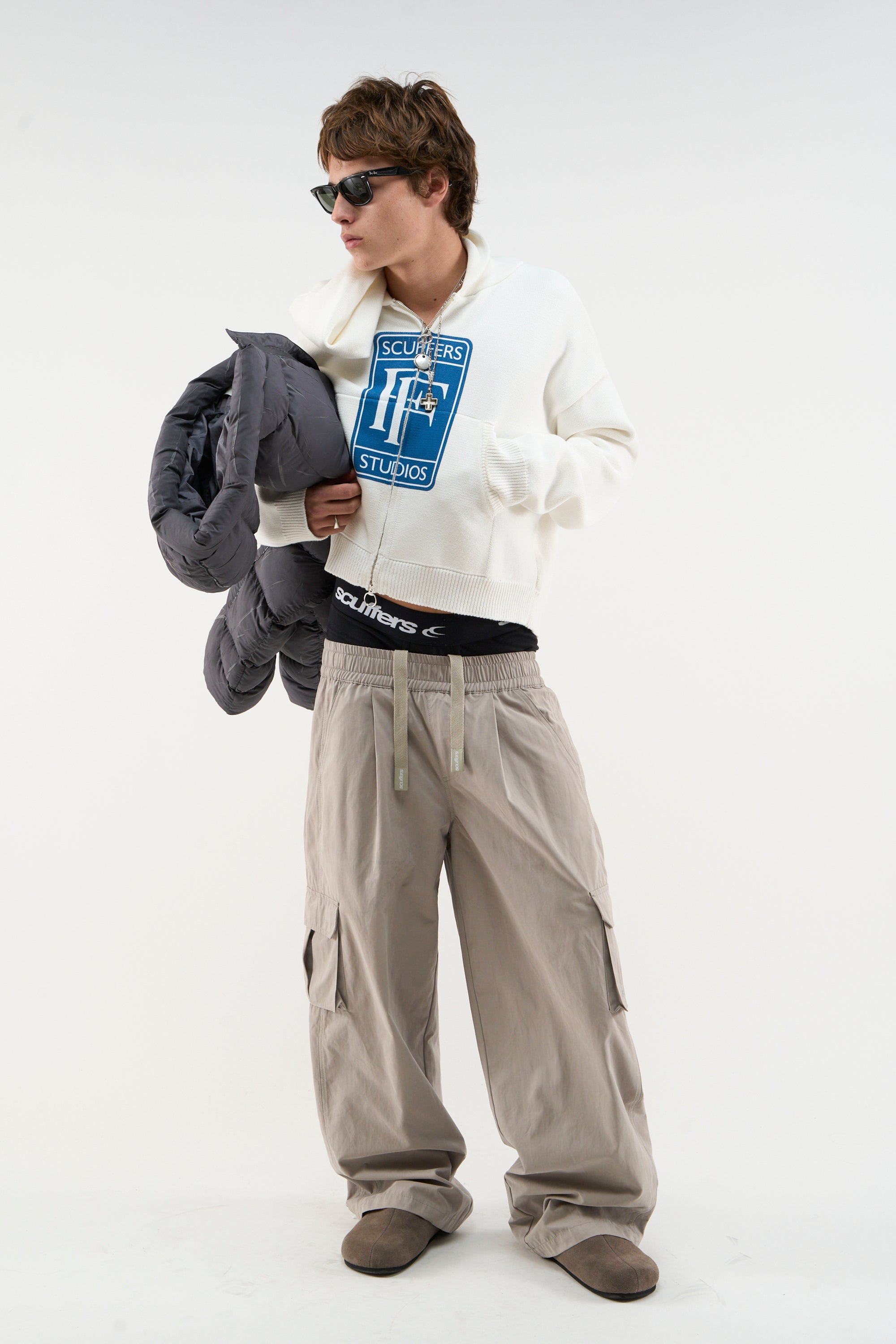 Fermeture éclair en tricot blanc roulé