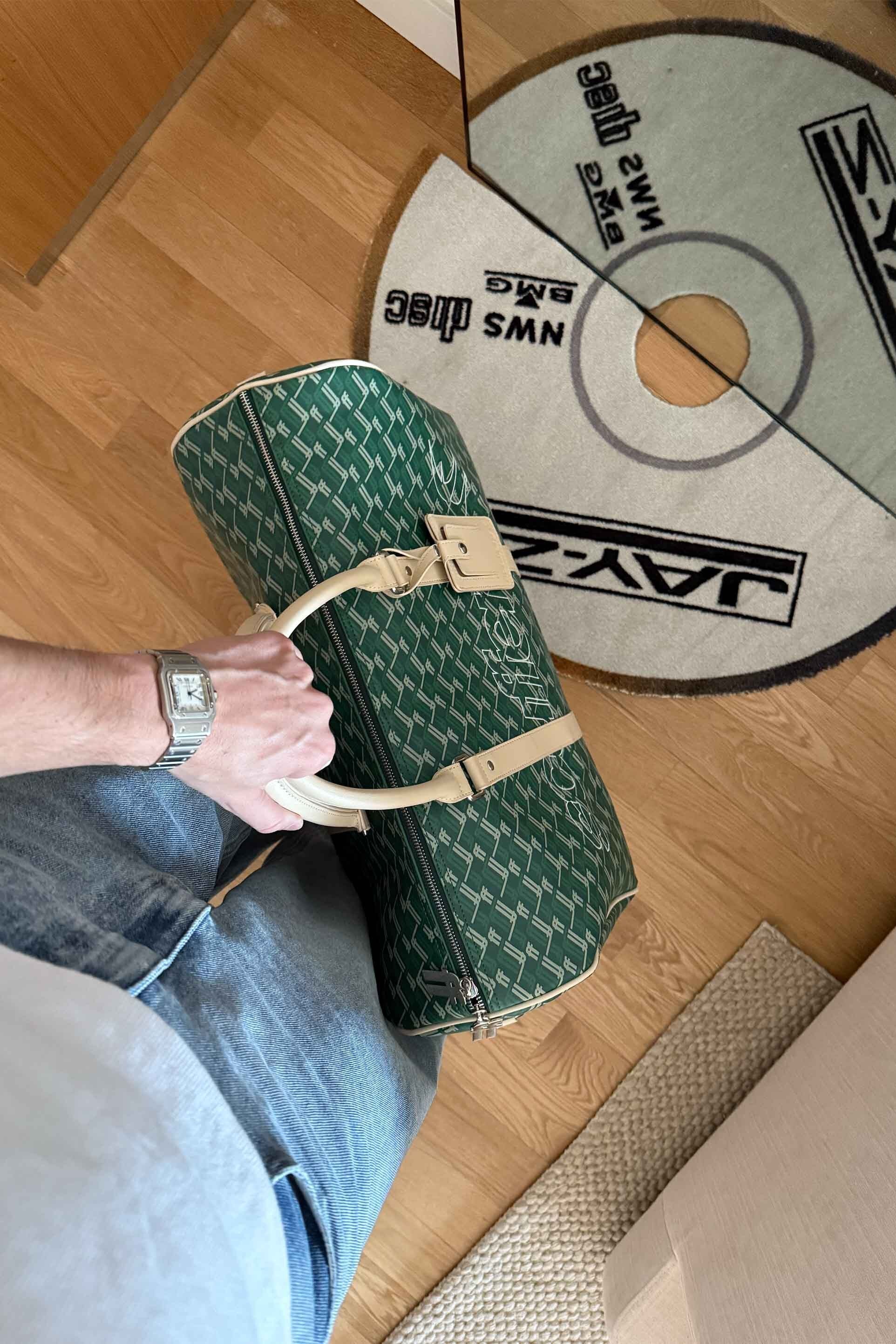 Sac de voyage vert monogrammé