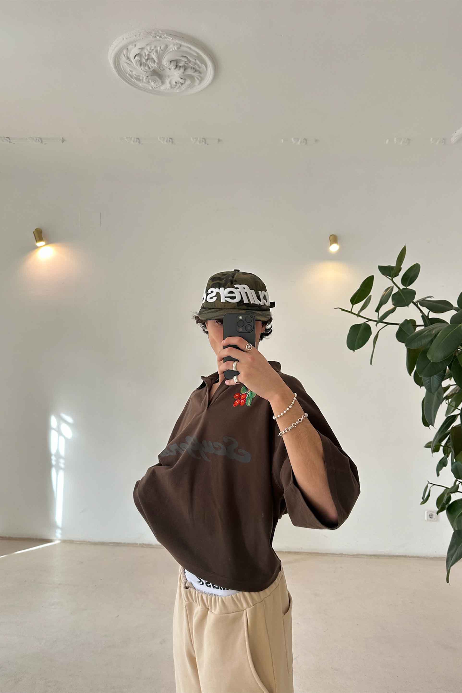 Polo marron tropical